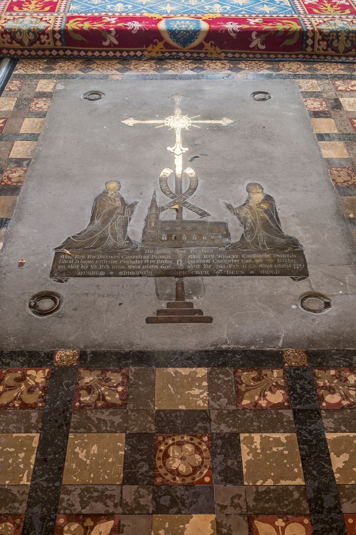 Memorial brass to the brothers North beneath the Altar